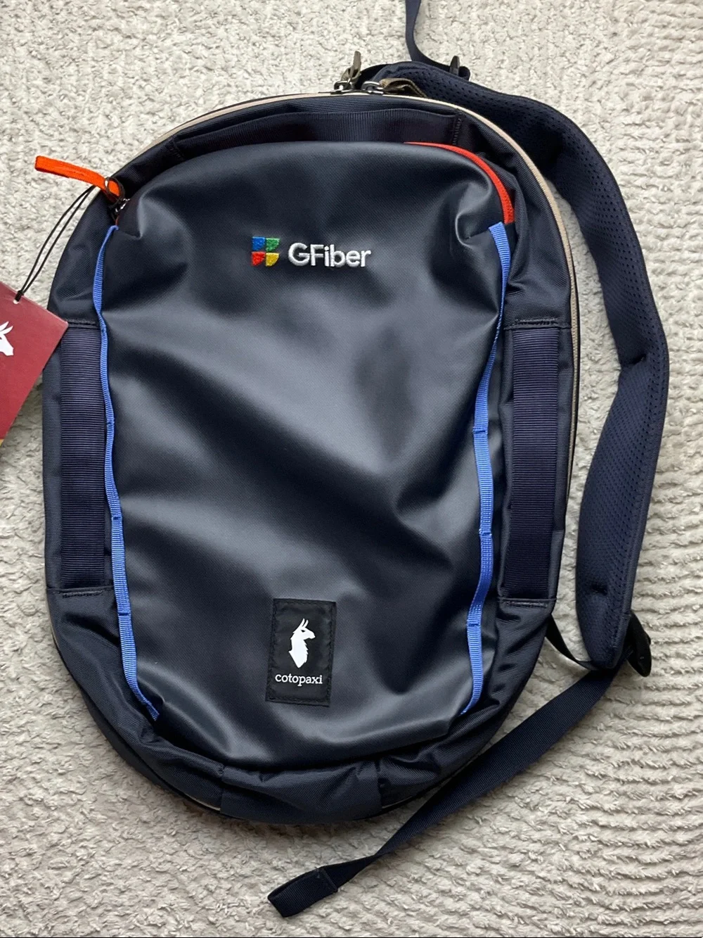 cotopaxi Chasqui 13L Sling Bag Graphite Color with Blue and Orange Accents